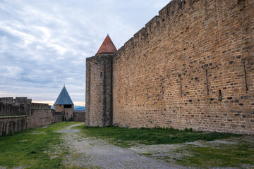 Sunset on the southern side of the lices hautes in the Cité of Carcassonne, the medieval fortified city of Carcassonne, Department of the Aude, Occitanie region, France. UNESCO World heritage site.