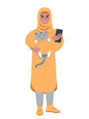 Young woman wearing headscarf with cat and smartphone