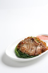 chef cook dry noodle mee with grilled chicken chop, pork cutlet and vegetable in soy sauce and chilli sauce asian halal menu