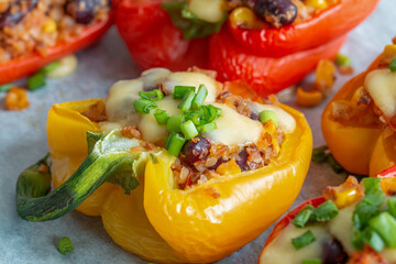 Peppers stuffed with groats and vegetables, sprinkled with cheese. - 441722452