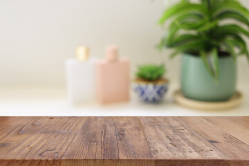 empty table board and defocused vintage woman toilet desk background. product display concept
