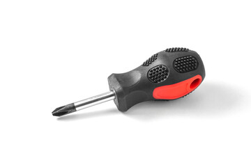 Little hand screwdriver on a white background with shadow. Close-up.