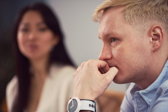 Multiracial couple having argument during psychotherapy session
