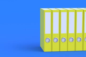 Row of binder file folders of yellow color on blue background. Copy space. 3d render - obrazy, fototapety, plakaty