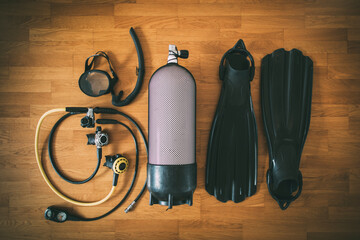 Diving cylinder, fins, snorkel set,  and scuba regulator