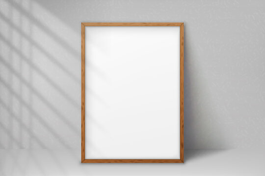Mockup wood frame photo on wall. Mock up artwork picture framed. Vertical boarder with shadow. Empty board photoframe a4. Design border for blank poster, painting image, prints. Vector illustration