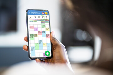 Executive Using Digital Calendar Agenda
