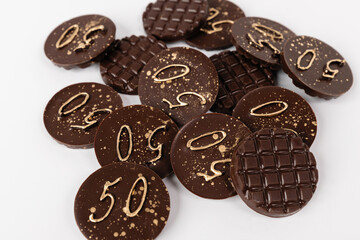 natural chocolate medallions, 50 years anniversary, sweet invitation