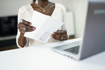 African Woman Holding Mail