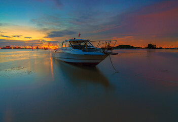 boat on  beauty sunset in Batam island