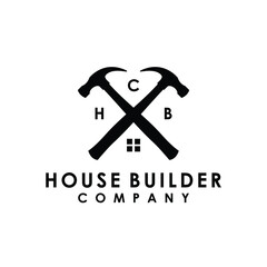 crossed hammer house builder construction renovation logo design vector
