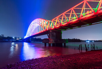 Beautiful night on the colorful bridge of Carang River Tanjung Pinang this photo was taken on the night