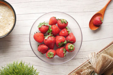 fresh strawberry in a bowl on table 