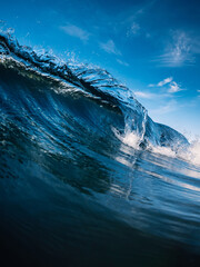 Perfect glassy wave in ocean. Crashing sea wave