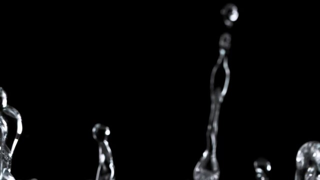 Super slow motion of water splash on black background. Filmed on high speed cinema camera, 1000 fps.