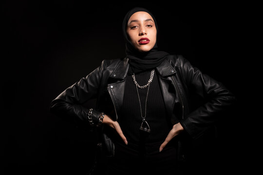 Gorgeous Muslim woman in black headscarf and leather jacket