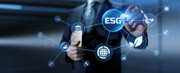 ESG environmental social governance business strategy investing concept. Businessman pressing button on screen.