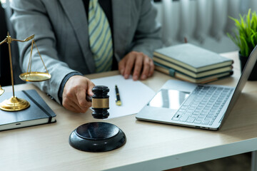 justice and law concept. Close-up Of male lawyer working in office. Legal law, advice and justice concept.