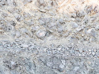 Detail of a stone pit in stone quarry. Industrial site, granite gravel