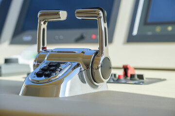 Gearbox switch detail. Close-up view to a dashboard with navigation system of modern luxury yacht  in the captain's cockpit