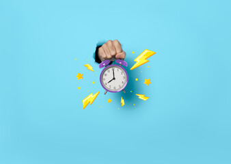 Hand showing alarm clock Hour Sale on blue background. deadline, time to promotion sale concept.