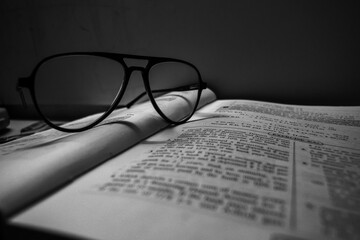 glasses on the book