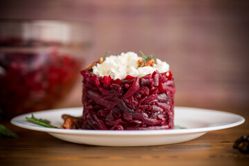dietary salad of boiled beets with walnuts and cottage cheese