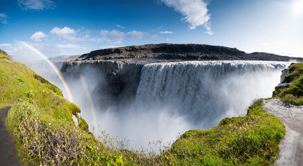 Rainbow at Dettifoss waterfall in Northeast Iceland. Beautiful nature icelandic landscape