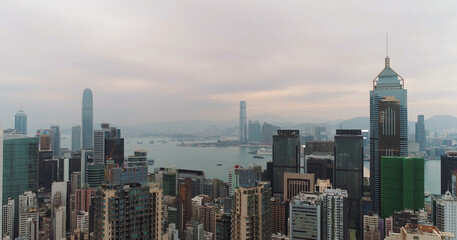 Fototapeta na wymiar AERIAL. Hong Kong Sunrise, View from The drone, Hong Kong Sun shape in the sky