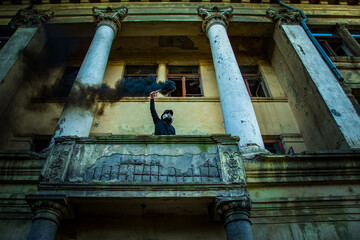 Fototapeta na wymiar person in the building with smoke 