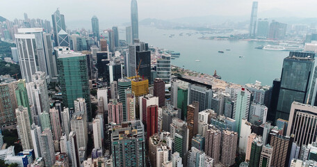 Fototapeta na wymiar AERIAL. Hong Kong Sunrise, View from The drone, Hong Kong Sun shape in the sky