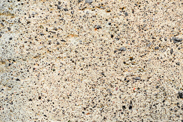 Texture of a concrete wall with cracks and scratches which can be used as a background