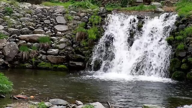 Beautiful waterfall on the Arrago river in the town of Robledillo de Gata, Spain