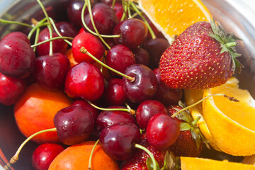 Closeup of strawberry with fruits mix and selective focus