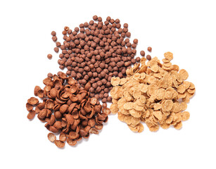 Heaps of different cereals on white background