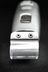 hair clipper on black background, barber shop background