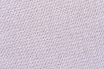 Fototapeta na wymiar Texture of light canvas fabric, closeup