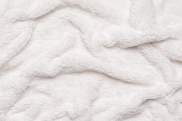 Texture of white fluffy fabric, closeup