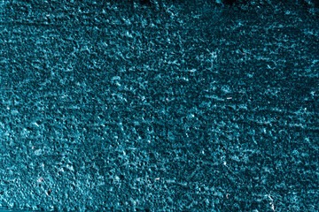 Niebieska brokatowa ściana, artystyczne tło, ciekawa tekstura.