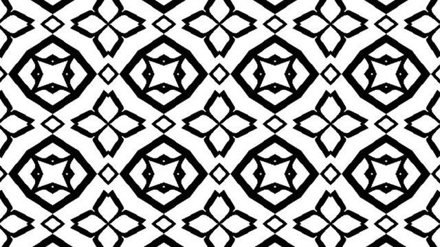 symmetrical repeating black-and-white patterns change their shape. abstract background 