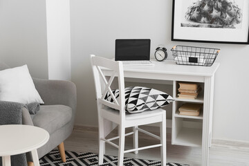 Modern workplace in interior of stylish room