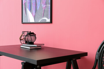 Stylish decor on table in interior of stylish room