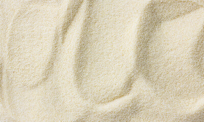 Fototapeta na wymiar Raw dried semolina background, texture, horizontal, top view 