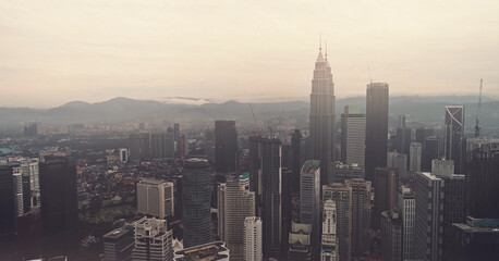 Aerial view. Panorama of Kuala Lumpur at sunset. Malaysia Cinematic style.