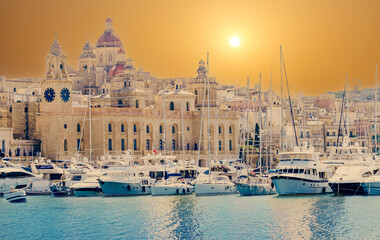 Beautiful scene of the famous Marina Museum of Malta and the harbor dockland illuminated by the...
