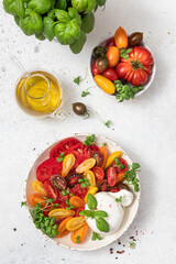 Salad with tomatoes and burrata cheese