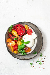 Salad with tomatoes and burrata cheese