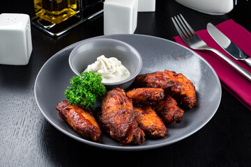 american buffalo wings with sauce, a traditional American snack