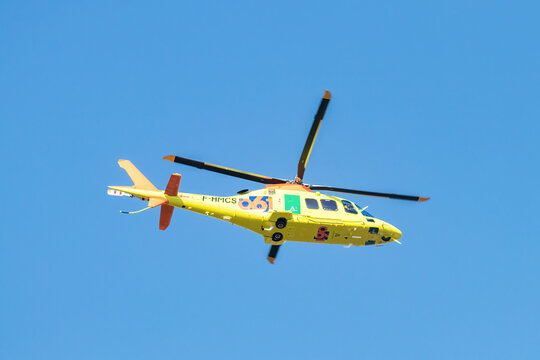 Huelva, Spain - June 26, 2021: Agustawestland A109S Grand belonging to the fleet of helicopters 061 of the Junta de Andaluc&iacute;a. Helicopter medicalized for emergencies, in Huelva, Andalusia, Spain