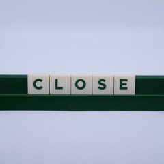 CLOSE, word on white background. 